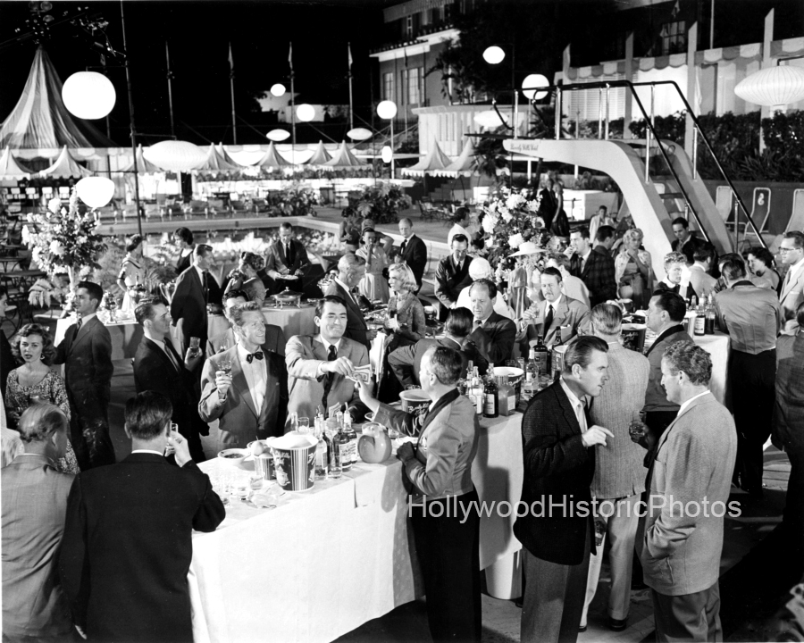 Gregory Peck 1957 3 BH Hotel Designing Women WM.jpg